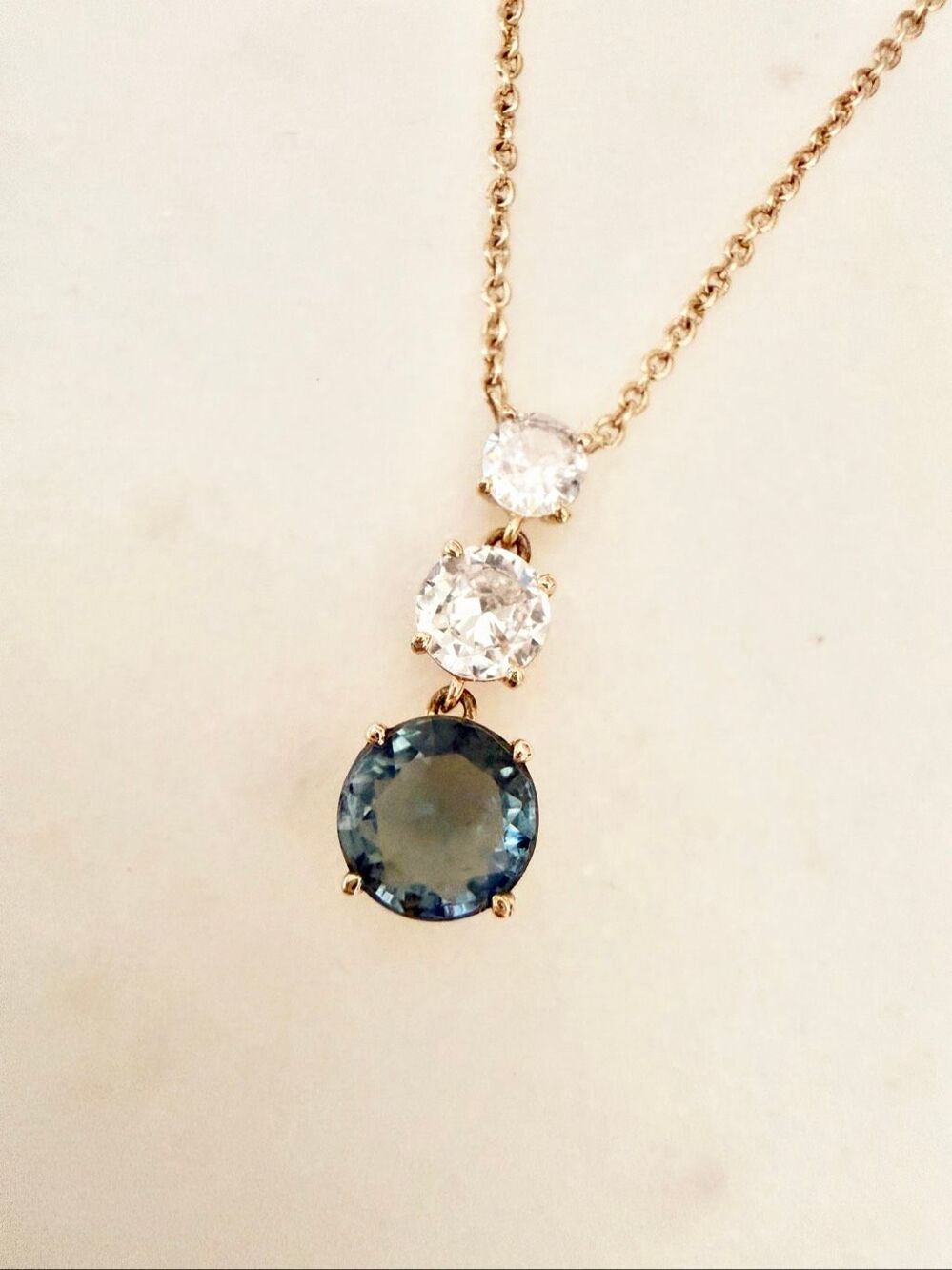 NADRI Blue Cubic Zirconia Three Stone Pendant Necklace Gold Tone